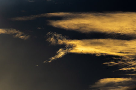 Cloudscape, Colored Clouds at Sunset near the Ocean as a Backgroundの写真素材