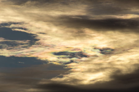 Cloudscape, Colored Clouds at Sunset near the Ocean on a Cloudy Dayの写真素材
