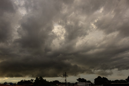 Storm clouds before a thunderstorm in the countryside of Thailand.の写真素材