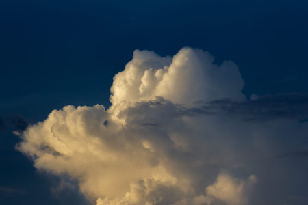 Cloudscape has been developing in gorgeous form. The background is blue sky and white clouds.