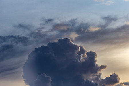 Clouds before a thunder-storm at sunset as an abstract background.