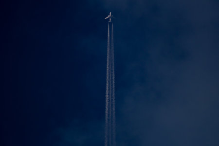 Airplane in the blue sky. Airplane in the sky.の写真素材