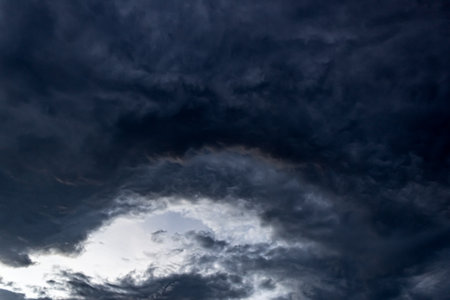 Dark clouds before a thunderstorm in the sky. Dramatic sky.の写真素材