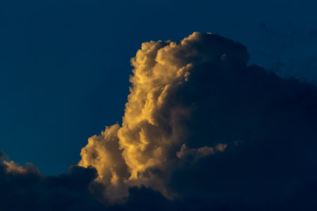 Cloudscape, Colored Clouds at Sunset near the Ocean on a Cloudy Dayの写真素材