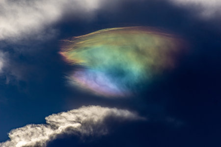 Aurora borealis, also known as the northern lights, is a large, brightly-colored cloud formation.