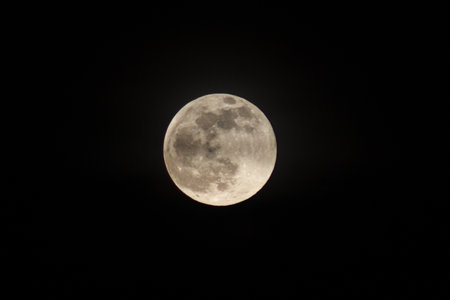 Full moon in the night sky, closeup of photo with soft focusの写真素材