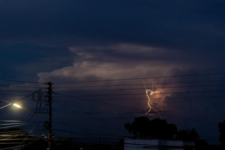 Lightning strike in the evening sky, thunderstorm and lightning.