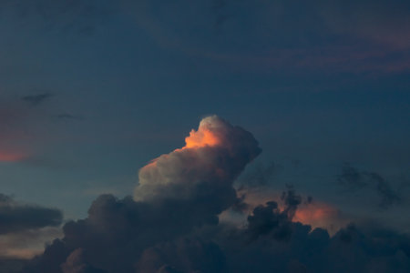 Cloudscape, Colored Clouds at Sunset near the Ocean, on a Cloudy Dayの写真素材