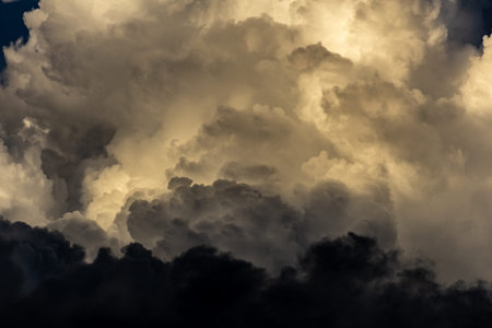 Dramatic stormy sky with dark clouds. Abstract nature background
