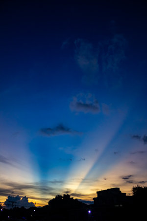 Light rays from the sun on the background of the night sky.の写真素材
