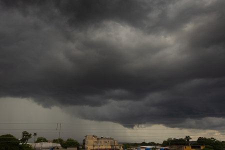 Dark storm clouds before a thunderstorm in the town of Colombo, Sri Lanka.