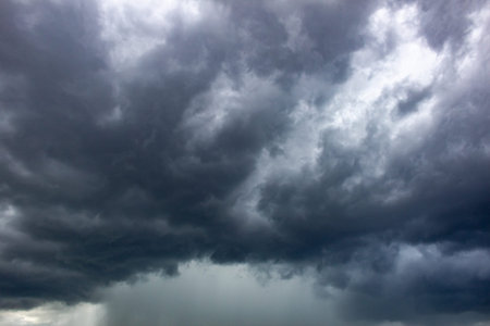 Dark storm clouds before a thunder-storm, nature background photo.