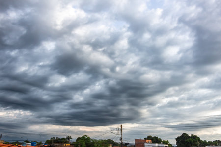 Clouds in the sky before a thunderstorm at sunset.の写真素材