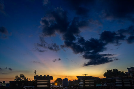 Sunset sky with clouds in the city.の写真素材