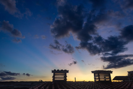 Sunset on the roof of the old house in Bangkok, Thailandの写真素材