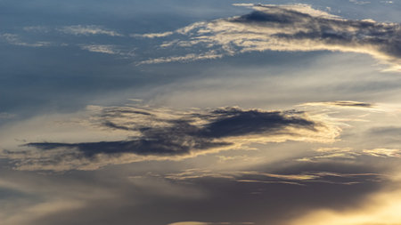 Cloudscape, Colored Clouds at Sunset near the Ocean in a Tropical Climate