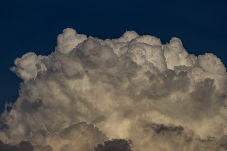 Cloudscape has been developing in gorgeous form. The sky is filled with soft white clouds.の写真素材