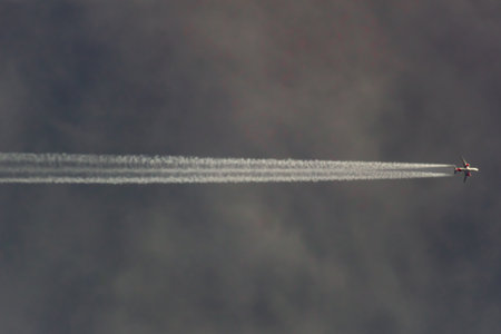 Airplane in the sky on a background of clouds.の写真素材