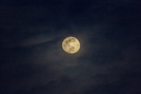 Full moon in the night sky with clouds, beautiful photo digital picture