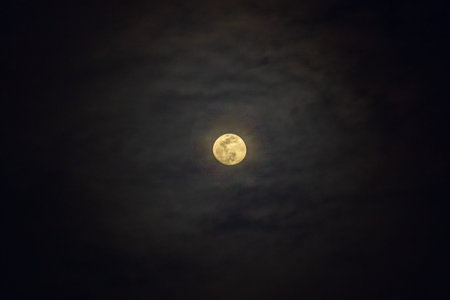 Full moon in the night sky with clouds, beautiful photo digital picture