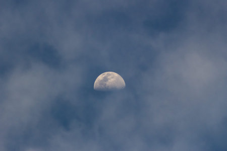 Moon in the clouds in the blue sky, beautiful photo digital picture