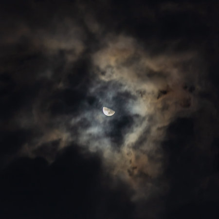 The moon in the night sky in clouds 3D Illustration.