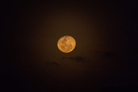 Full moon in the night sky, closeup of photo with selective focusの写真素材
