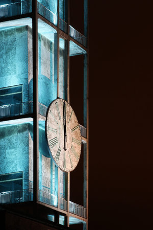 Clock of Aarhus city hall in Denmarkby night
