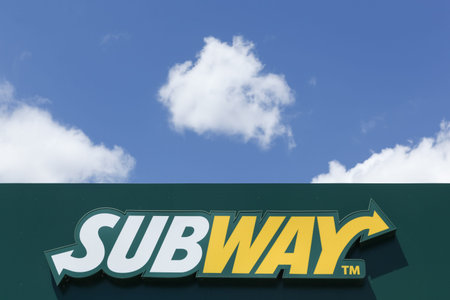 Lyon, France - July 27, 2015: Subway logo on a facade. Subway is an American fast food restaurant franchise that primarily sells submarine sandwiches and saladsのeditorial素材