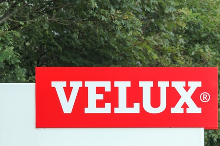 Ostbirk, Denmark - September 5, 2015: Velux logo at the entrance of a factory. Velux is a danish company that specializes in windows and skylights.のeditorial素材