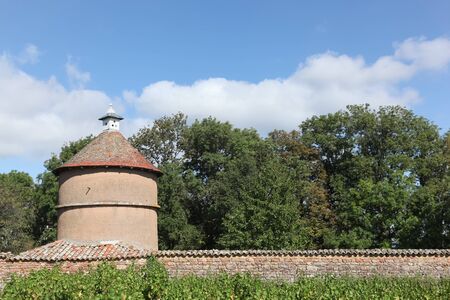 Old dovecote with vineyard in Beaujolais, Franceの写真素材