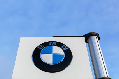 Aarhus, Denmark - December 13, 2015: BMW logo on a panel. BMW is a German luxury automobile, motorcycle and engine manufacturing company founded in 1916. BMW is headquartered in Munich, Bavaria, Germanyのeditorial素材
