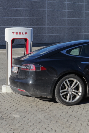 Aarhus, Denmark - February 13, 2016: Tesla supercharger station in Aarhus. Tesla is an American automotive and energy storage company that designs, manufactures and sells luxury electric carsのeditorial素材