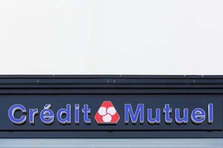 Macon, France - March 22, 2016: Credit Mutuel logo on a wall. Credit Mutuel is a major French bank, with headquarters in Strasbourg, Alsaceのeditorial素材
