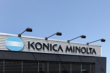Aalborg, Denmark - May 8, 2016: Konica Minolta logo on a wall. Konica Minolta is a Japanese technology company headquartered in Japan. The company manufactures business and industrial imaging productsのeditorial素材