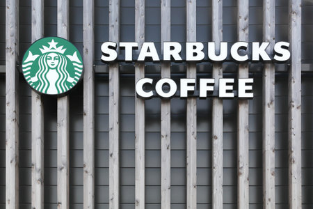 Villefranche, France - July 14, 2016: Starbucks logo on a wall. Starbucks is an American coffee company and coffeehouse chainのeditorial素材