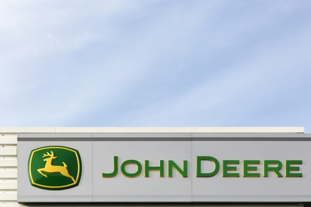 Trige, Denmark - September 22, 2016:  John Deere sign on a wall. John Deere is an American corporation that manufactures agricultural, construction, and forestry machinery, diesel enginesのeditorial素材