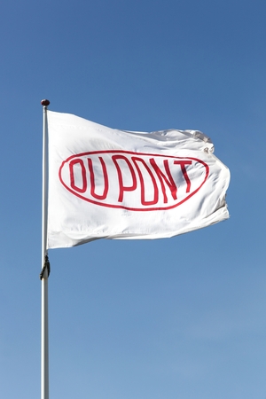Aarhus, Denmark - May 16, 2016: Flag of the brand Du Pont. DuPont is one of America's most innovative companies and it is an American chemical company that was founded in July 1802 as a gunpowder millのeditorial素材