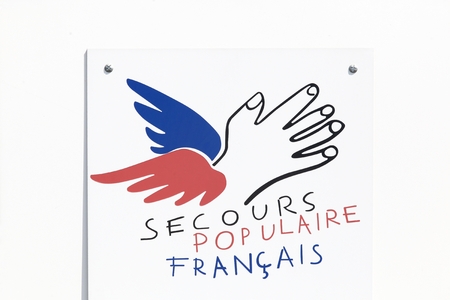Grenoble, France - June 25, 2017: The Secours Populaire Francais or French Popular Relief, is a French non-profit organization dedicated to fighting poverty and discrimination in public lifeのeditorial素材