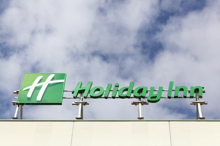 Merignac, France - June 6, 2017: Holiday Inn logo on a building. Holiday Inn is an American brand of hotels and a subsidiary of InterContinental Hotels Groupのeditorial素材