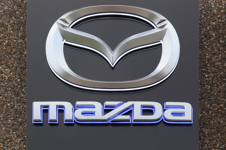Skanderborg, Denmark - October 21, 2017: Mazda logo on a facade. Mazda is a Japanese automaker based in Fuchu, Japanのeditorial素材