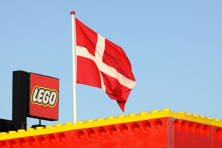 Billund, Denmark - November 12, 2015: Lego logo on a building. Lego is a line of plastic construction toys that are manufactured by the danish Lego Groupのeditorial素材
