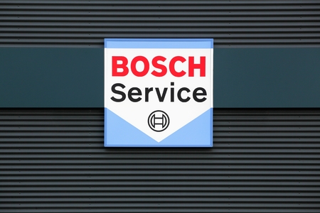 Hinnerup, Denmark - October 28, 2017: Bosch service logo on a wall. Bosch Car Service garages provide vehicle maintenance, repairs and diagnostics for all makes of vehicles in 150 countriesのeditorial素材