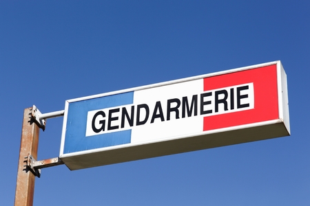 Sign of the french gendarmerie on a poleの写真素材
