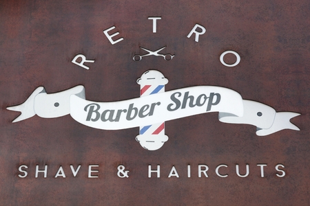 Grenoble, France - June 25, 2017: Retro barbershop sign on wallのeditorial素材