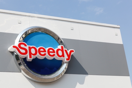 Grenoble, France - June 24, 2017: Speedy logo on a wall. Speedy is a French car maintenance and repair companyのeditorial素材
