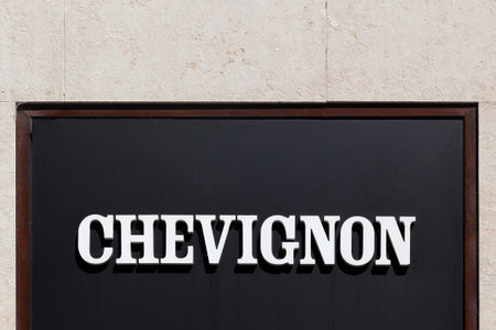Lyon, France - May 26, 2017: Chevignon logo on a wall. Chevignon is a French ready-to-wear company...