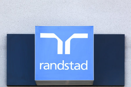 Villefranche, France - March 14, 2018: Randstad on a wall. Randstad is a Dutch multinational human...