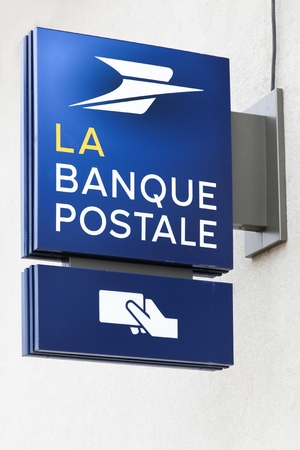 Villefranche, France - March 18, 2018: Banque postale on a wall. La Banque postale is a French bank created on 1 January 2006 as a subsidiary of La Poste, the national postal serviceのeditorial素材