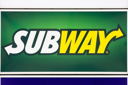 Bremen, Germany - July 31, 2015: Subway on a wall. Subway is an American fast food restaurant franchise that primarily sells submarine sandwiches and saladsのeditorial素材
